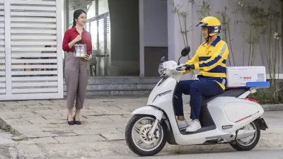 Milky Way smart box mounted on a Vinfast scooter.