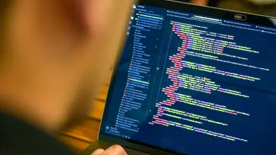 Programmer writing code. 